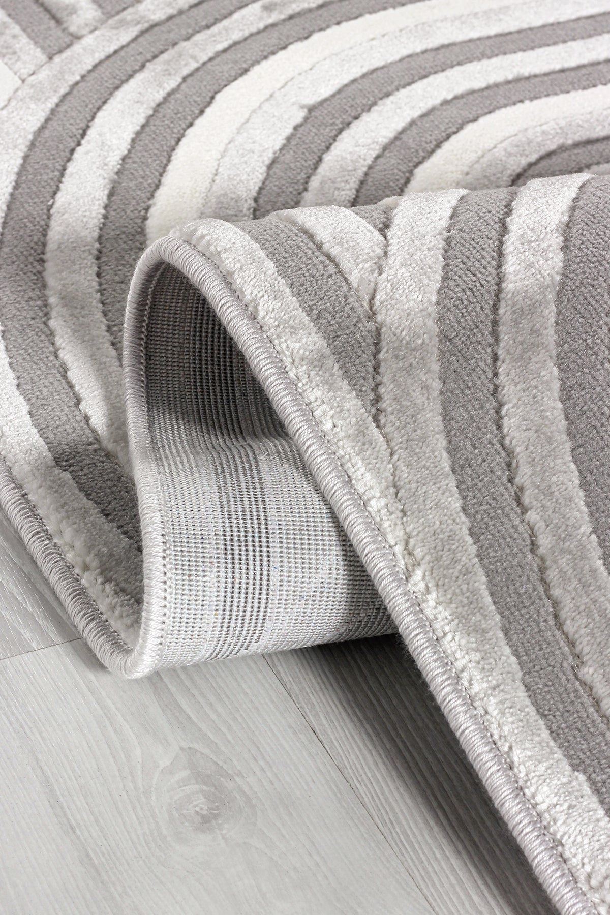 Tapis beige en situation dans un salon Image