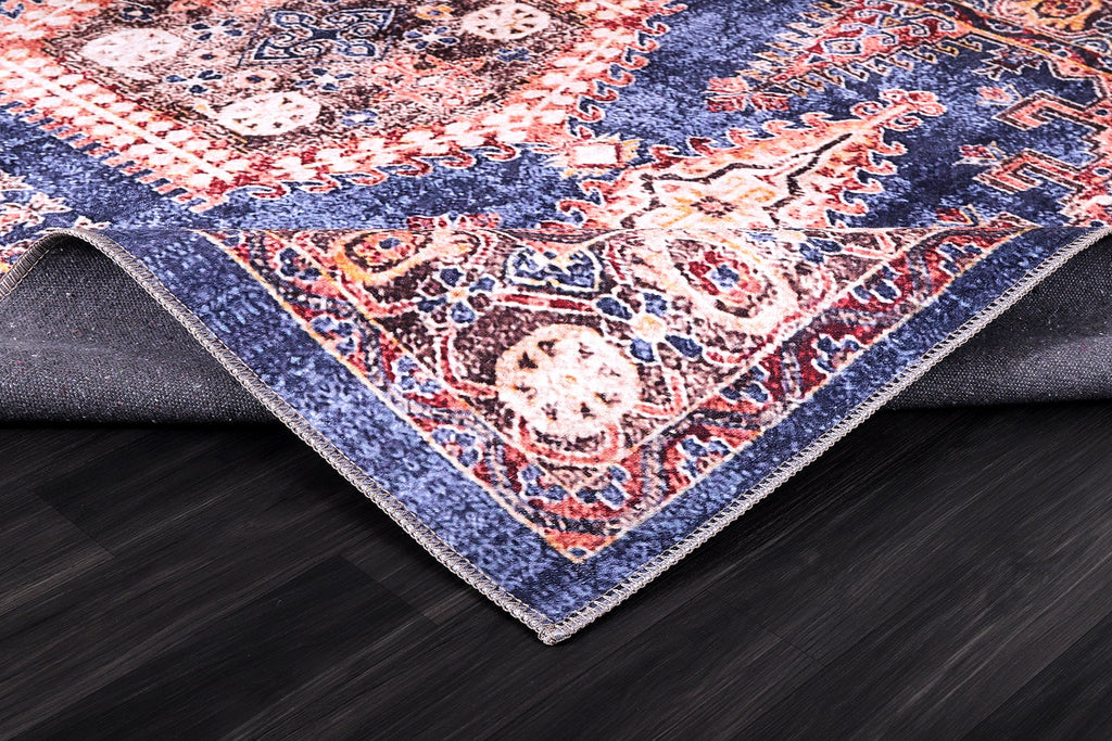 Détail du motif du tapis ethnique bordeaux lavable Olympe