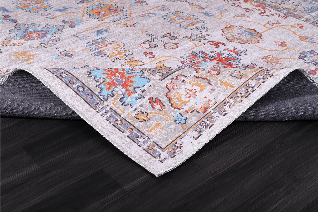 Détail du motif du tapis classique vintage crème et blanc lavable Faustine