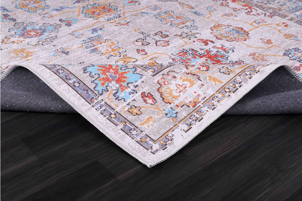 Détail du motif du tapis classique vintage crème et blanc lavable Faustine