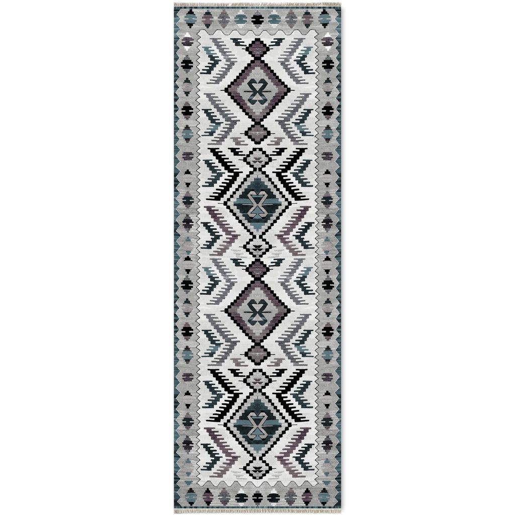 Détail du motif du tapis ethnique gris lavable Zélia