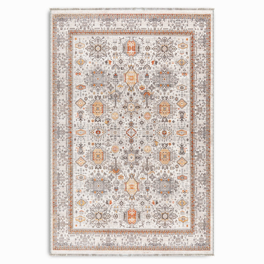 Détail du motif du tapis ethnique vintage crème et blanc lavable Carla